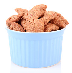 Dry breakfast in a small round bowl on white background