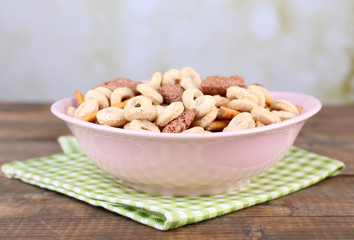Dry breakfast on a green napkin on a wooden table