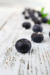 Blueberries on wooden background closeup