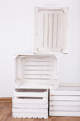 Empty wooden crates in room