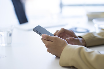 Young woman using mobile phone