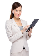 Asian businesswoman touch on digital tablet