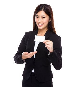 Asian businesswoman present with name card