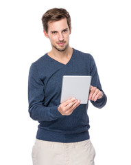 European man use digital tablet