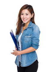 Young woman with clipboard