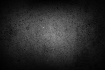 Dark black or grey textured concrete wall background