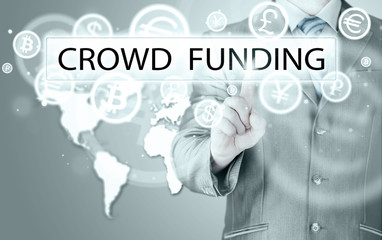 Businessman pushes virtual crowd funding button