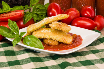 Zucchini Parmesan dinner with basil