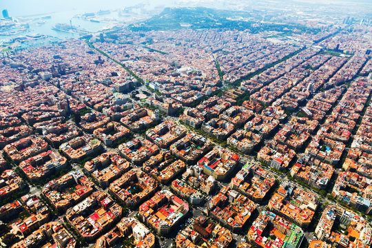 Aerial View Of Barcelona Cityscape From Helicopter