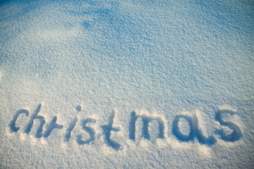 background from inscription Christmas on snow