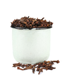 Metal round mug full of seasoning on white background isolated