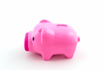 Pink piggy bank saving.