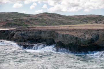 Waves breaking on the shore