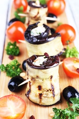 Fried aubergine with cottage cheese and parsley in n a cutting
