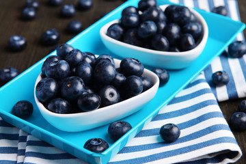 Delicious blueberries on table close-up