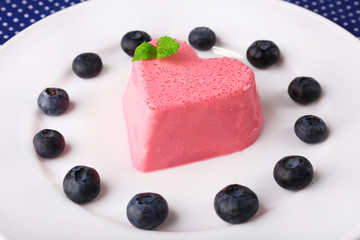 Heart shaped cake with blueberries