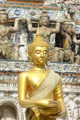 Giant Buddha in Wat Arun pagoda at Bangkok, Thailand