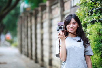 Outdoor summer portrait of young pretty cute girl