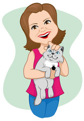 Woman carrying a cat in her arms