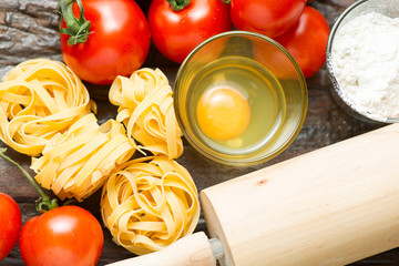 Ingredients for cooking mediterranean dish on old wooden table