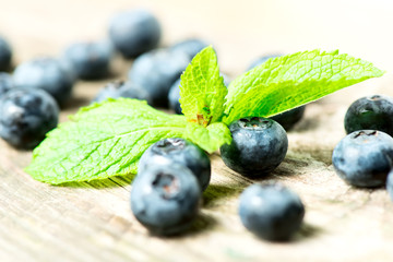 Blueberries on wooden table close up