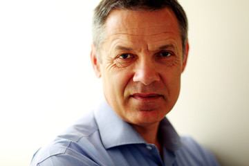 Closeup portrait of a happy mature man