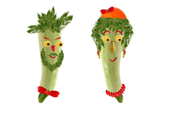 Two funny portrait of men and women, made ??from zucchini and fr