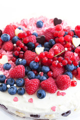 Homemade creamy cake decorated with fresh berries