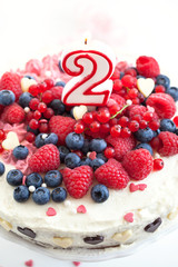 Homemade creamy cake decorated with fresh berries