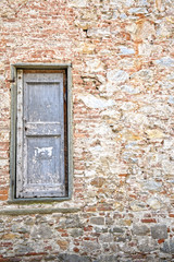 Stone wall with wooden door