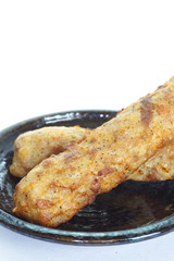 Deep fried chicken  knees tendon with skewer
