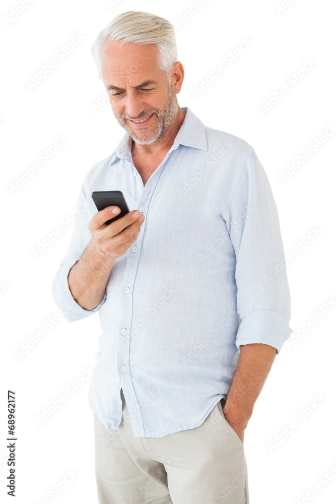 Leinwandbilder smiling man sending a text message