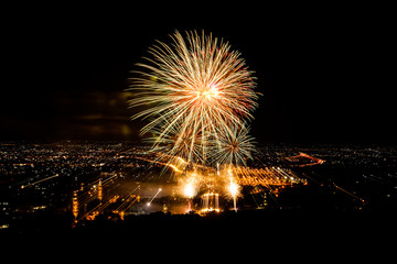 Fireworks in night cityscape.