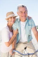 Fototapeta premium Happy senior couple going for a bike ride