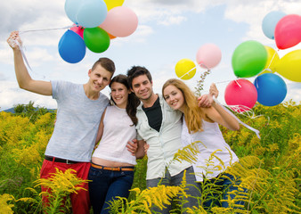 Happiness: Young couples with colorful balloons :)