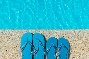 Flip Flop on Wood Floor pool edge with surface