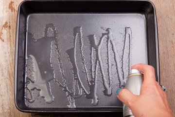 spray oil in backing tray