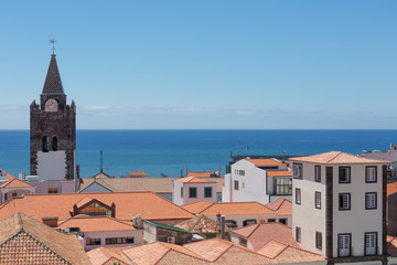 Fototapeta premium Aerial view roofs of Funchal with cathedral tower, Madeira