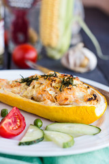 stuffed zucchini with chicken and vegetables and cheese