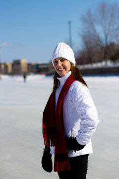 Portrait of a young woman on a skating rink