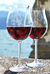 Two wineglasses. Varenna town at the lake Como, Italy