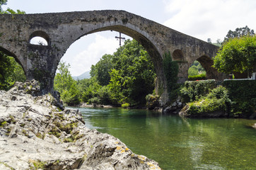Fototapeta na wymiar Roman Bridge Sella River Cangas de Onís Cavadonga Spain