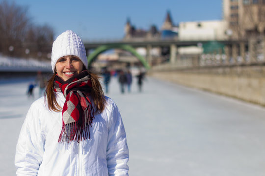 Attractive woman on the Ottawa Rideau Canal Skateway during wint