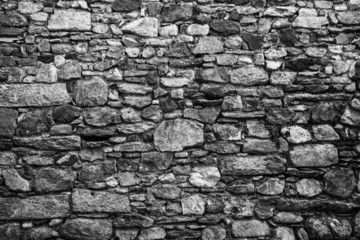 Old stone wall. Black and white image