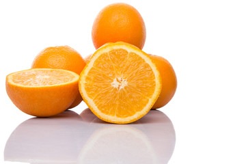 Orange fruits over white background