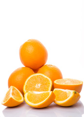 Orange fruits over white background