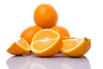 Orange fruits over white background