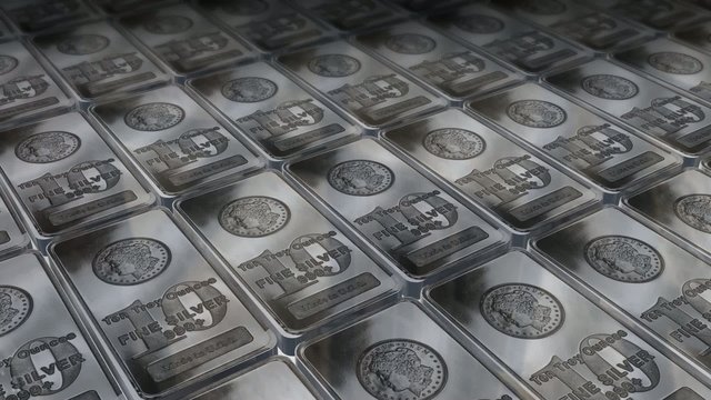 Dolly shot across 10 ounces silver bars