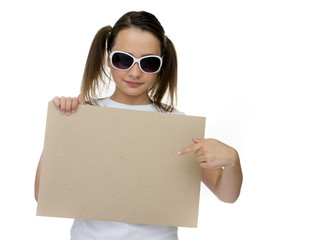 Trendy young girl pointing to a blank card