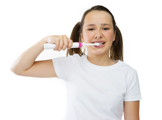 Healthy cute girl brushing her front teeth